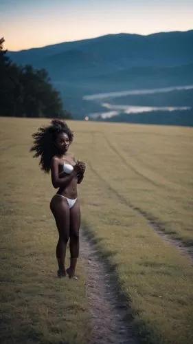 a woman with long black hair and white bikini,ledisi,ukwu,gabourey,bastareaud,kenya,siedah