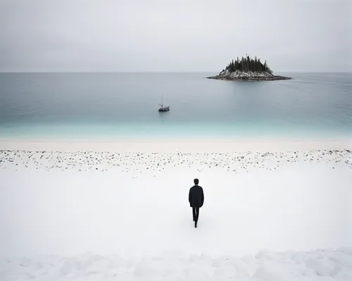 Create a suspenseful Dathomirian exploration on a deserted island.,conceptual photography,man at the sea,andreas cross,to be alone,grey sea,photomanipulation,dark beach,isolated,the people in the sea,