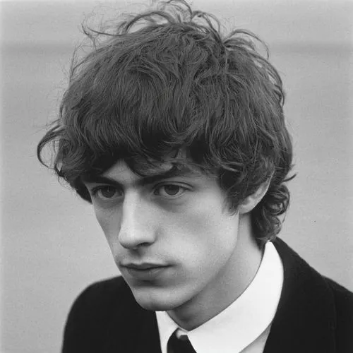 random image ,black and white pograph of young man in suit with neck tie,durutti,hillel,stoppard,daltrey,gedney,ringo,weller,john lennon,jansch,garrel,stenmark,paul,lennon,cocozza,mick,syd,jagger,geor