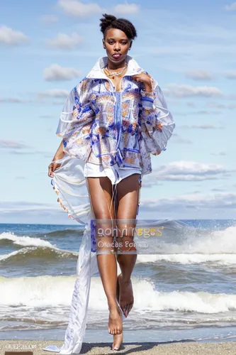 african woman,beach background,fashion shoot,walk on the beach,african american woman,nigeria woman,majorette (dancer),the sea maid,divine healing energy,woman in menswear,travel woman,social,plus-size model,woman walking,girl on the dune,girl on a white background,female model,fashion model,portrait photography,beach scenery