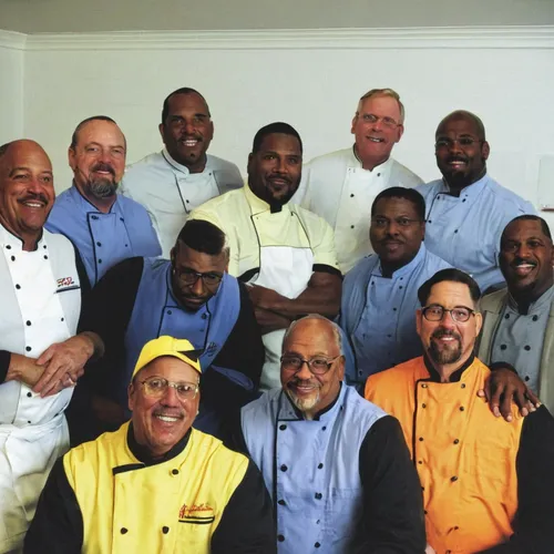 Chefs: (front row, from left): Ricardo Stovall, Rev. E.T. Burton, Councilman Bill Bestpitch, Darnell Glover, John Elliott, Michael Creasy, Jack Ehlenback. Back row:  Andre' Peery, Peter Lewis, Lee Gra