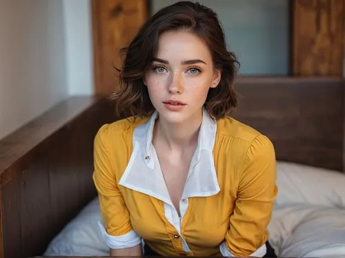 in a shirt,cardigan,woman sitting,tulip,girl sitting,yellow background,attractive woman,hazel,sitting on a chair,yellow brown,beautiful young woman,cotton top,yellow,female model,white shirt,young woman,romantic look,model,woman portrait,jena,Photography,General,Natural