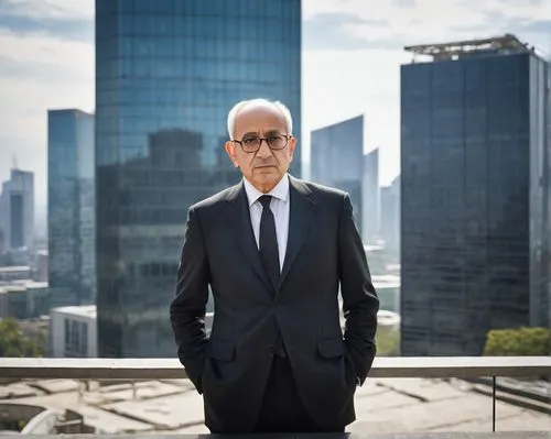 Middle-aged man, architecture critic, Saffron, standing, hands behind back, black suit, white shirt, tie, glasses, balding hair, serious facial expression, urban cityscape background, modern skyscrape