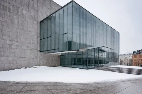 National Museum of Art, Architecture and Design, Oslo, Norway, modern building, white granite exterior, angular lines, glass roof, natural light, interior courtyard, grand staircase, wooden floors, co