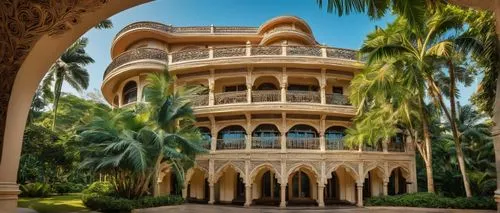 W.I.C (Women's Indian Chamber) building, modern Indian architecture, intricate stone carvings, ornate balconies, curved lines, symmetrical composition, warm beige walls, turquoise accents, grand entra