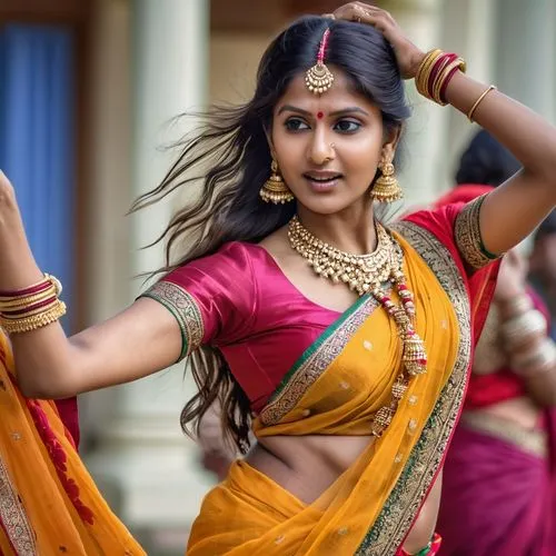 dancing Indian woman in a sari with loose hair ,bharatanatyam,ethnic dancer,kuchipudi,bharatnatyam,natyam,sari,lavani,varalakshmi,vijayalakshmi,surabhi,sarayu,rajakumari,shakuntala,vaani,ramlila,rajal