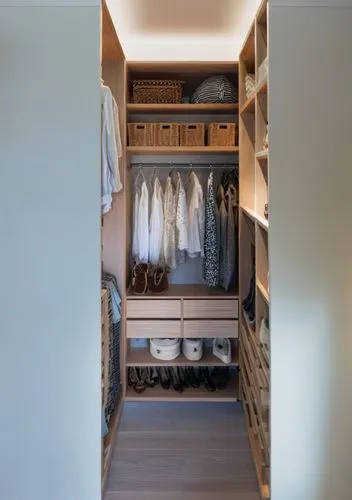 
dressing room with white shelves and neatly laid out and hung clothes, stylish, beautiful, neat, cozy, illuminated shelves.,a wooden closet with shoes and coats,walk-in closet,mudroom,wardrobes,close