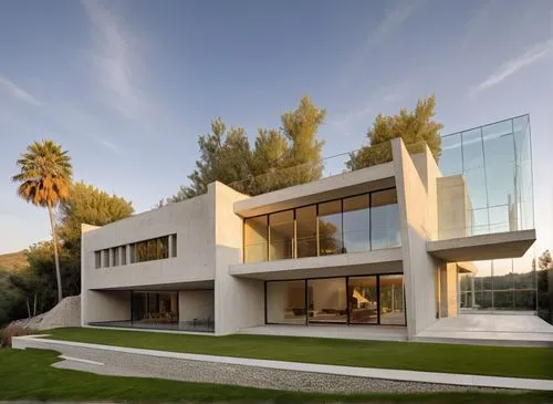 In a spacious masterful study, a minimalist house with a minimalist style exudes relaxation and beauty. The facade of the house is adorned with intricate concrete facades and plush carpet, with polish