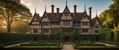 Elizabethan architecture, grandiose, ornate, stone walls, tall spires, stained glass windows, wooden doors with intricate carvings, majestic entrance, symmetrical facade, Renaissance-inspired, Tudor-s