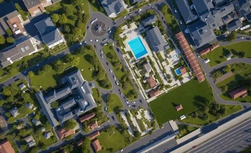 aerial view of buildings and street near pool,jernbanetorget,paved square,microdistrict,tartu,urban park,suburbia,Photography,General,Realistic