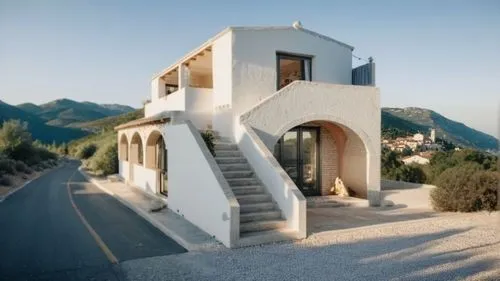 dunes house,cubic house,house in mountains,house in the mountains,house shape,holiday villa,residential house,stucco frame,stucco wall,private house,frame house,architectural style,folding roof,roof landscape,clay house,inverted cottage,exterior decoration,stone house,archidaily,holiday home