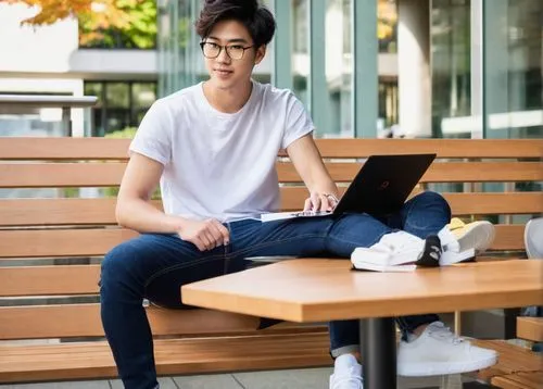 male, young adult, 20s, student, bachelor of design in architecture, UBC, casual wear, denim jeans, white T-shirt, black sneakers, backpack, laptop, books, sitting, studying, indoor, university campus