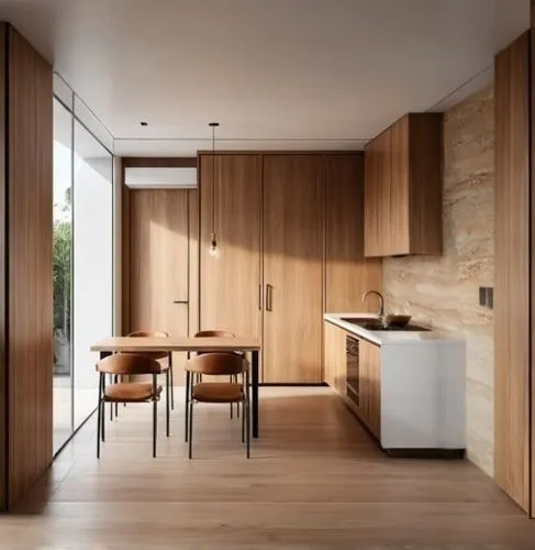 modern kitchen interior,modern kitchen,kitchen design,modern minimalist kitchen,kitchen interior,wood casework,laminated wood,interior modern design,limewood,kitchens,kitchen,associati,contemporary decor,gaggenau,corian,cabinetry,kitchen block,tile kitchen,kitchen counter,kitchenette