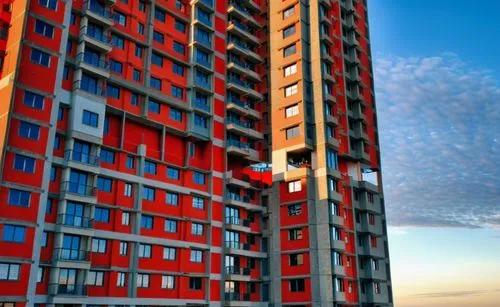 a young women with red hair,sky apartment,tower block,high rise building,high-rise building,residential tower,apartment blocks,apartment block,skyscraping,highrise,high rises,skycraper,escala,high ris