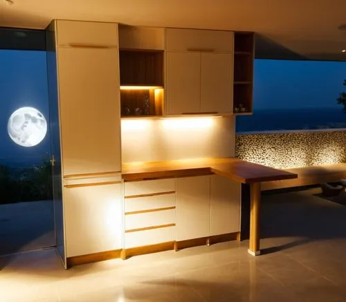 The scene is bathed in the soft glow of a full moon, which casts a warm glow on the kitchen. The walls of the room are designed consistently, inviting guests to sit at their feet and savor the flavors