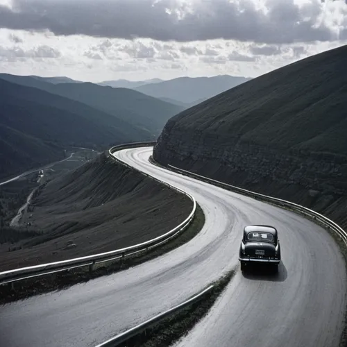 the transfagarasan,transfagarasan,winding roads,bernina pass,winding road,steep mountain pass,stelvio yoke,stelvio,the pamir highway,mountain pass,alpine drive,mountain highway,alpine route,mountain road,vanishing point,mercedes-benz r107 and c107,mercedes-benz w114,rolls-royce phantom vi,mercedes-benz w112,mercedes benz w123,Photography,Black and white photography,Black and White Photography 10