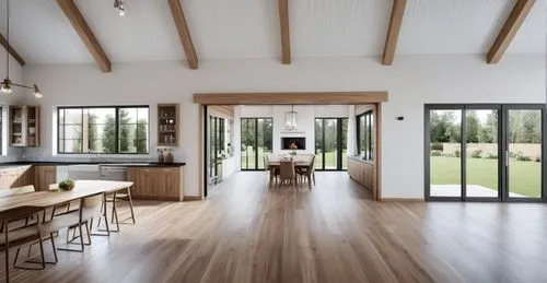 KITCHEN OVERLOOKING SUNROOM WITH DINING TABLE. TO THE LEFT A AWNING WINDOW OVERLOOKING OUTDOOR BARBEQUE SPACE AND TO THE RIGHT A LARGE PATIO DOOR OVERLOOKING PATIO STAIRS AND BEAUTIFUL GARDEN
,kitchen