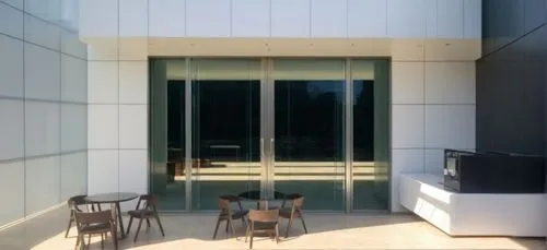 sliding door,glass facade,window film,steel door,block balcony,structural glass,metallic door,screen door,glass wall,metal cladding,patio,opaque panes,hinged doors,dialogue window,glass panes,house entrance,main door,lattice window,glass window,slat window