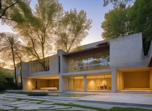 In a spacious masterful study, a minimalist house with a minimalist style exudes relaxation and beauty. The facade of the house is adorned with intricate concrete facades and plush carpet, with polish