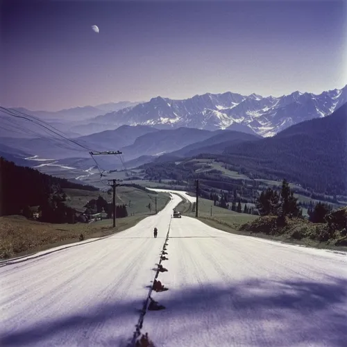 Think of a moment when someone is torn between two options and write about their internal struggle.,alpine drive,alpine route,south-tirol,winding roads,winding road,mountain highway,mountain road,moun