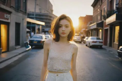 girl in a long dress,girl in white dress,lubitel 2,girl walking away,white dress,sun bride,girl in a long dress from the back,mary-gold,vintage angel,a girl in a dress,young model istanbul,angelic,goldenlight,white winter dress,city ​​portrait,elegant,lens flare,golden light,aura,pale