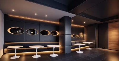 Food and beverage space in a wine store. Overall dark atmosphere. Dark gray fabric sofa and indirect lighting below. The wall of the sofa is a built-in cabinet where wine is displayed. Lighting on top