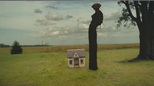 birdhouse,bird house,birdhouses,telephone pole,bird home,totem,wooden birdhouse,suitcase in field,outhouse,witch house,surrealism,scarecrows,tree stump,sculptor ed elliott,environmental art,strange tree,klaus rinke's time field,stump,sculpture park,digital compositing