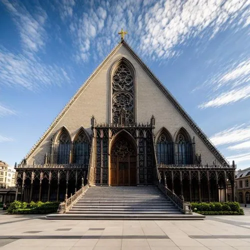 a big church with a very large steeple on the front,christ chapel,nidaros cathedral,st mary's cathedral,gothic church,cathedral,the cathedral,Architecture,Commercial Building,European Traditional,Span