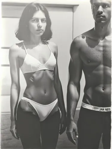 Same scene as black and white photo.,a woman in underwear and a man standing next to each other,workout icons,black couple,physiques,yuriorkis,hardbodies,nasir,Photography,Black and white photography,