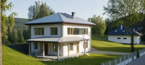 small modern house. The walls are white. Gray roof. There is a forest around the house.,a house on the grass with a fence around it,miniature house,model house,small house,little house,wooden house,ho