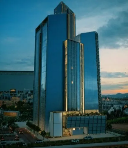 an image of a very tall blue building,kigali,rotana,ulaanbaatar centre,addis ababa,abuja,arcapita,Photography,General,Cinematic