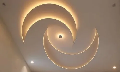 Gypsum decoration in the ceiling of a room with hidden LED lighting the ceiling,an artistic light ceiling in a white room,wall lamp,wall light,spiral art,ceiling light,spiral,waves circles,Photography