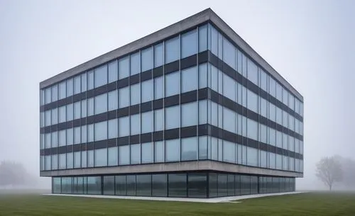 a large glass building in front of trees,architekten,office building,tschumi,glass facade,modern building,eisenman,Photography,General,Natural