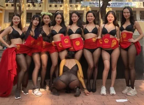 sexy fishnet,a group of women posing in lingerie clad outfits,miss vietnam,rockettes,asiaticas,asian culture,wax figures museum,korean culture