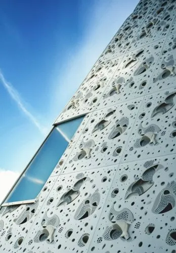 climbing wall,bjarke,building honeycomb,honeycomb structure,metal cladding,concrete construction,Photography,General,Realistic