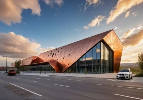 metal cladding,corten steel,kettunen center,tasmania,new building,artscience museum,glass facade,performing arts center,futuristic art museum,australia aud,convention center,modern architecture,bullring,facade panels,leisure centre,trondheim,sport venue,mclaren automotive,kirrarchitecture,event venue