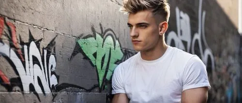 Robbie Barrat, male, 20s, muscular, athletic build, short spiky hair, piercing blue eyes, strong jawline, smizing, casual wear, white graphic t-shirt, ripped denim jeans, black and white Vans, relaxed