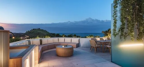 a lounge area next to the ocean with large tables and chairs,lefay,montreux,montreaux,amanresorts,roof terrace,terrazza,Photography,General,Realistic