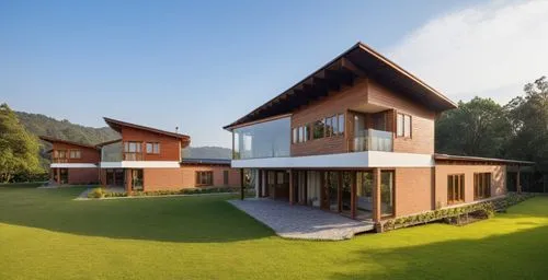 Мodern house surrounded by a forest.
The walls are white. Black roof.,the front of an enormous brick building with balconies and a courtyard,modern house,passivhaus,forest house,homebuilding,holiday v