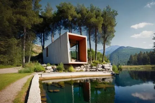 garden and finnish landscape in summer time,house with lake,amanresorts,pool house,summer house,inverted cottage,mirror house,corten steel,house by the water,house in the mountains,the cabin in the mo