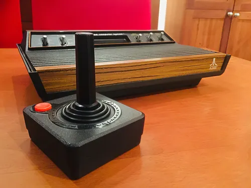 atari 2600,game joystick,digital bi-amp powered loudspeaker,atari,incense with stand,dremel