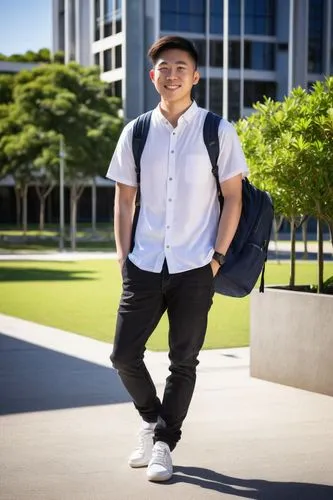 Male, young adult, bachelor of design architecture, QUT graduate, casual wear, white shirt, dark jeans, sneakers, backpack, confident pose, standing, university campus, modern buildings, greenery, sun