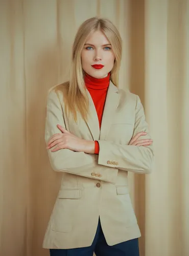 A plain woman with red lips, a blond long haired and blue eyed, wearing 'black blazer jacket' and 'cream-khaki cargo pants'.,menswear for women,woman in menswear,red coat,business woman,pantsuit,busin