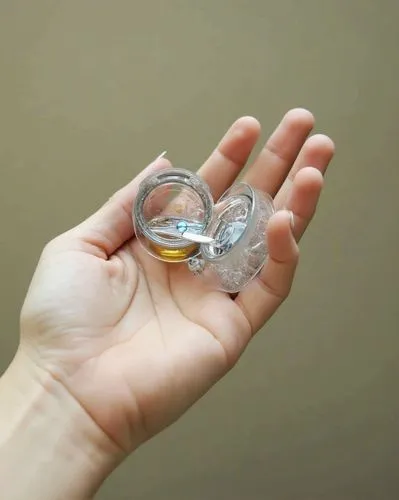 magnifying lens,pacifiers,make soap bubbles,gel capsules,ear plug,clear bowl