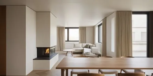 Minimalist Apartment Dinig and Living room Minimalist white fireplace in the middle light colored walls and ceiling
Light tone oak floor
Bronze metal window
Light curtains
Wooden dining table with woo