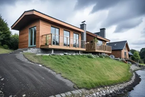 house with lake,passivhaus,house by the water,wooden house,timber house,danish house