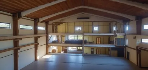 a large room with lots of windows inside of it,loft,dojo,hall,gymnast hall,interior view,mezzanine,Photography,General,Realistic