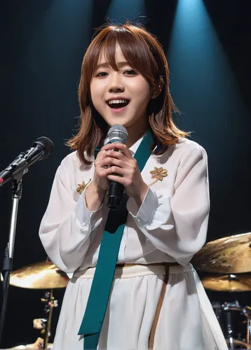 Describe a heartwarming moment where Yui Hirasawa receives a surprise gift from her bandmates.,korean handy drum,live concert,songpyeon,sujeonggwa,japanese idol,performing,singing,live performance,sol