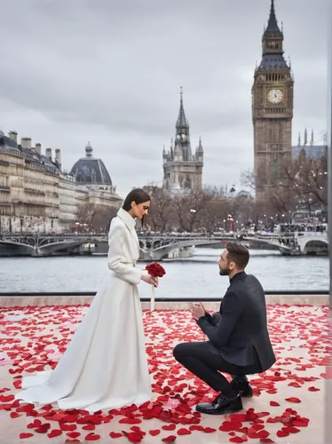 A surprise marriage proposal on Valentine's Day.,proposal,rose petals,marriage proposal,wedding photo,romantic scene,romantic,to marry,saint valentine's day,flower clock,couple goal,trafalgar square,r