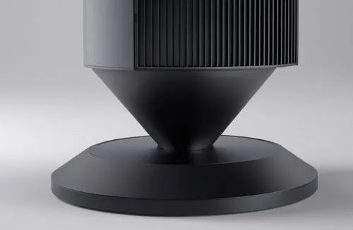 the base for a black projector on a grey surface,horn loudspeaker,digital bi-amp powered loudspeaker,loudspeaker,pc speaker,loudspeakers,the speaker grill,Photography,General,Realistic